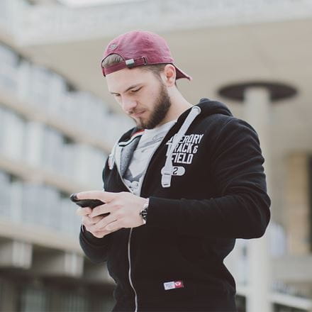male student on phone