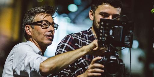 Two men filming a sceen