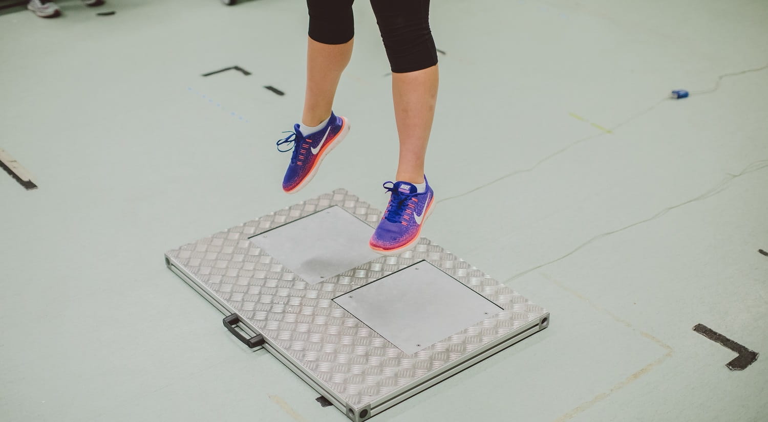 person jumping on force plates
