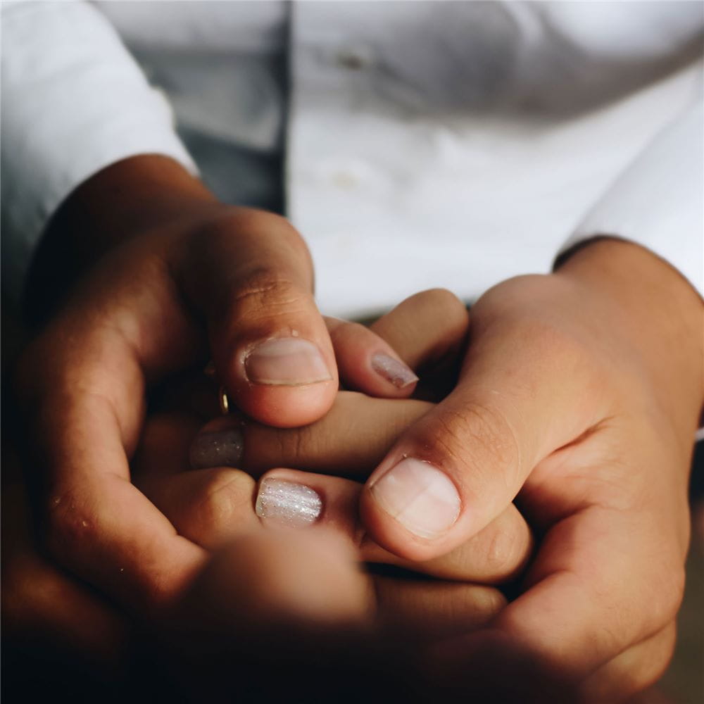 Hands holding