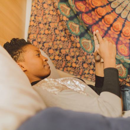 Student using wifi in accommodation room
