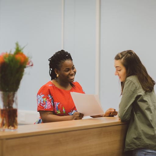 Student at reception desk