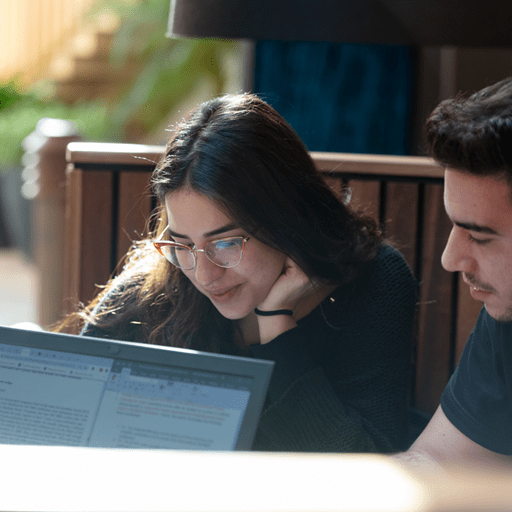 Undergraduate students studying together in Essex Business School